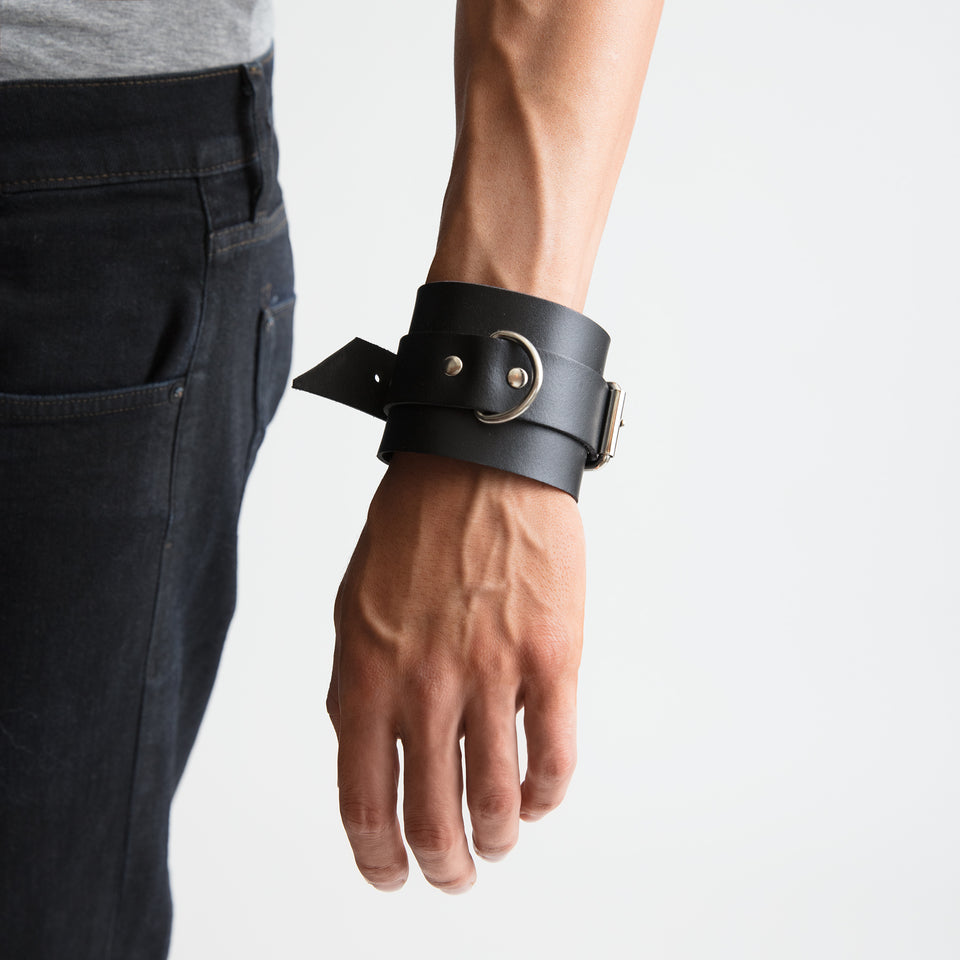 model wearing handcuffs mens bracelet