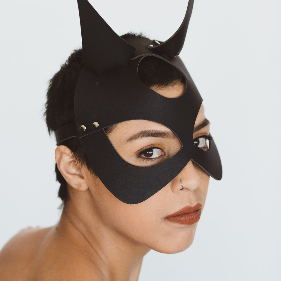 model wearing devil mask