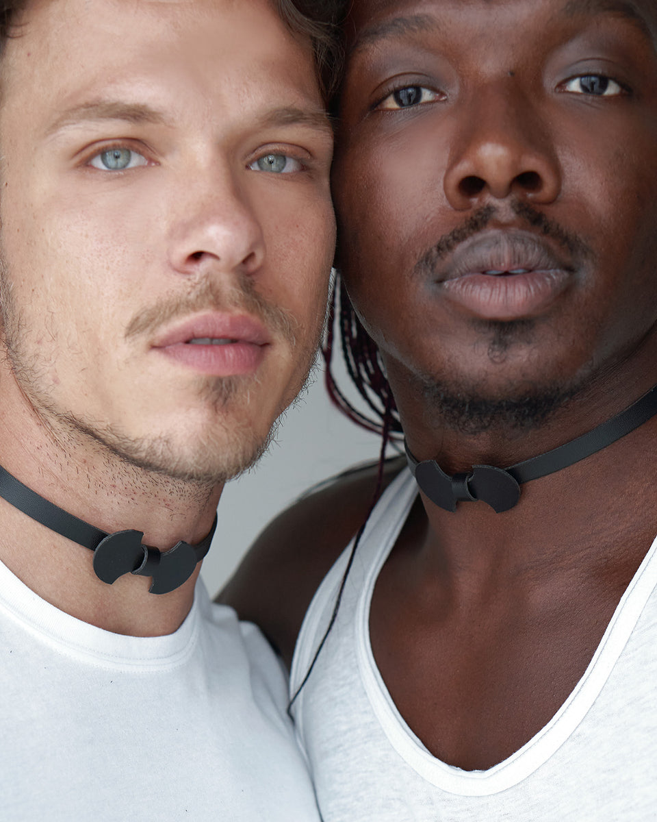 model wearing Batman choker